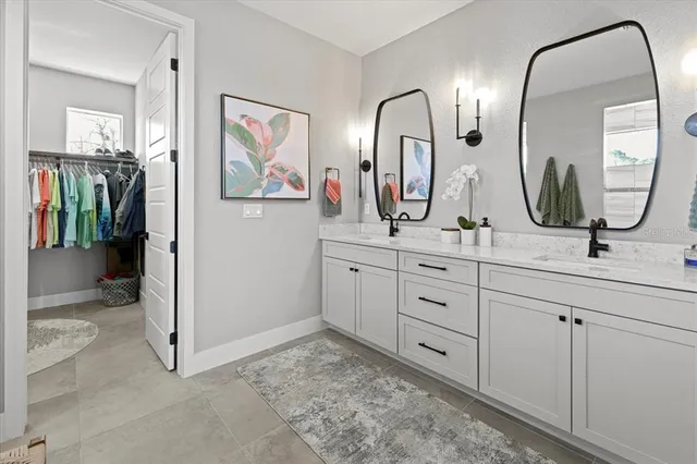 an aerial view of a house with a lake view