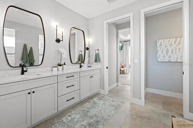 an aerial view of a house with yard