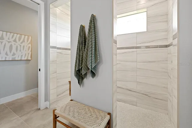 a view of a lake with houses in the back