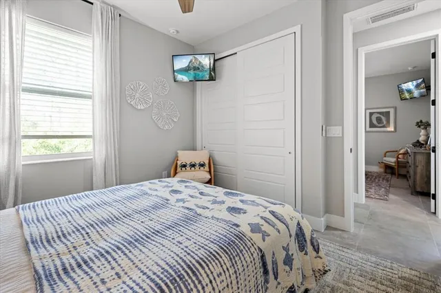 a view of a lake with houses in front of it