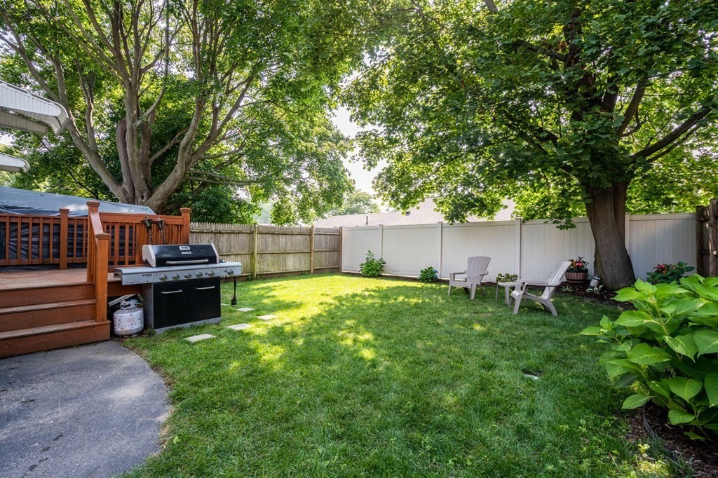 28 Rose Avenue, Unit 28 Watertown, MA 02472 - Photo 22 of 25 a view of a backyard with sitting area