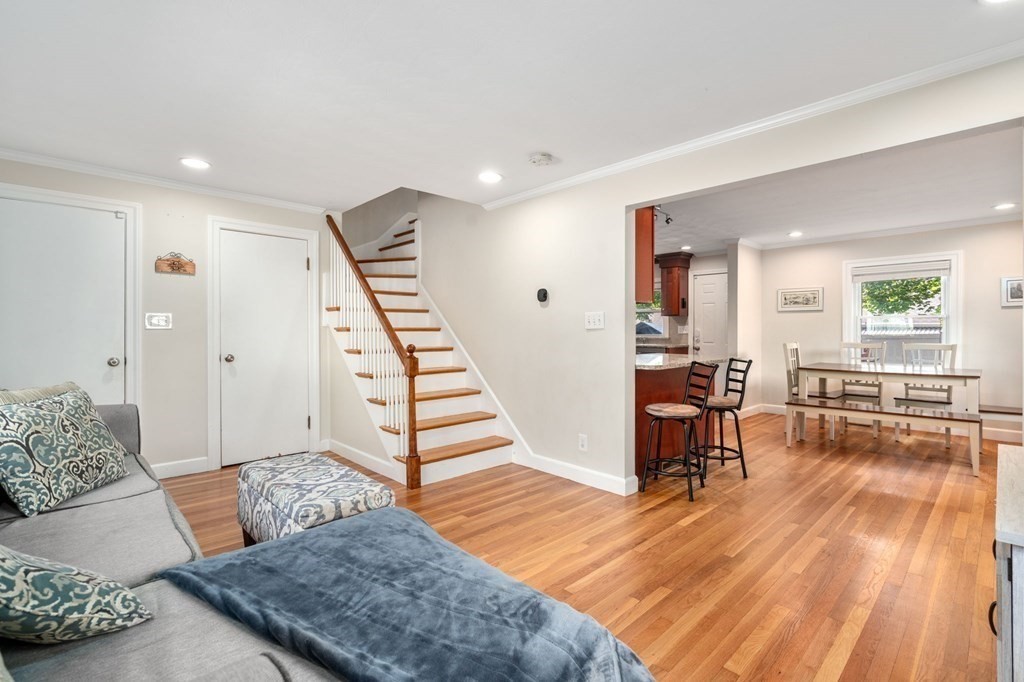 28 Rose Avenue, Unit 28 Watertown, MA 02472 - Photo 3 of 25 a living room with furniture and a wooden floor