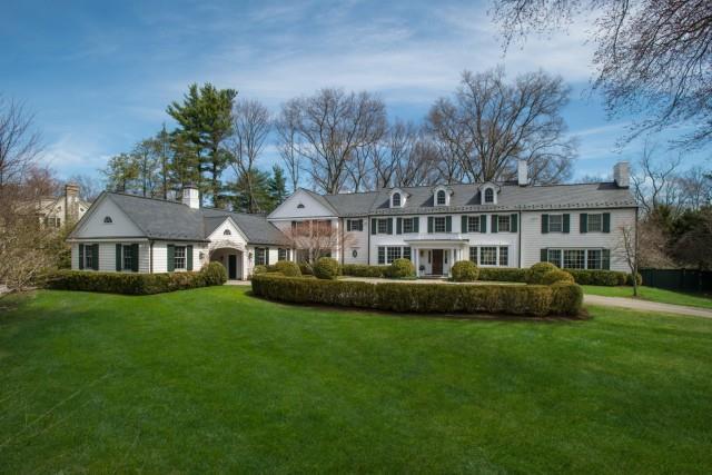 145 Parsonage Road Greenwich, CT 06830 - Photo 1 of 1 a front view of a house with a garden