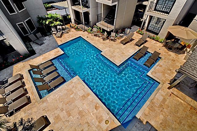 6910 Skillman Street, Unit 1007 Dallas, TX 75231 - Photo 23 of 24 a view of a backyard