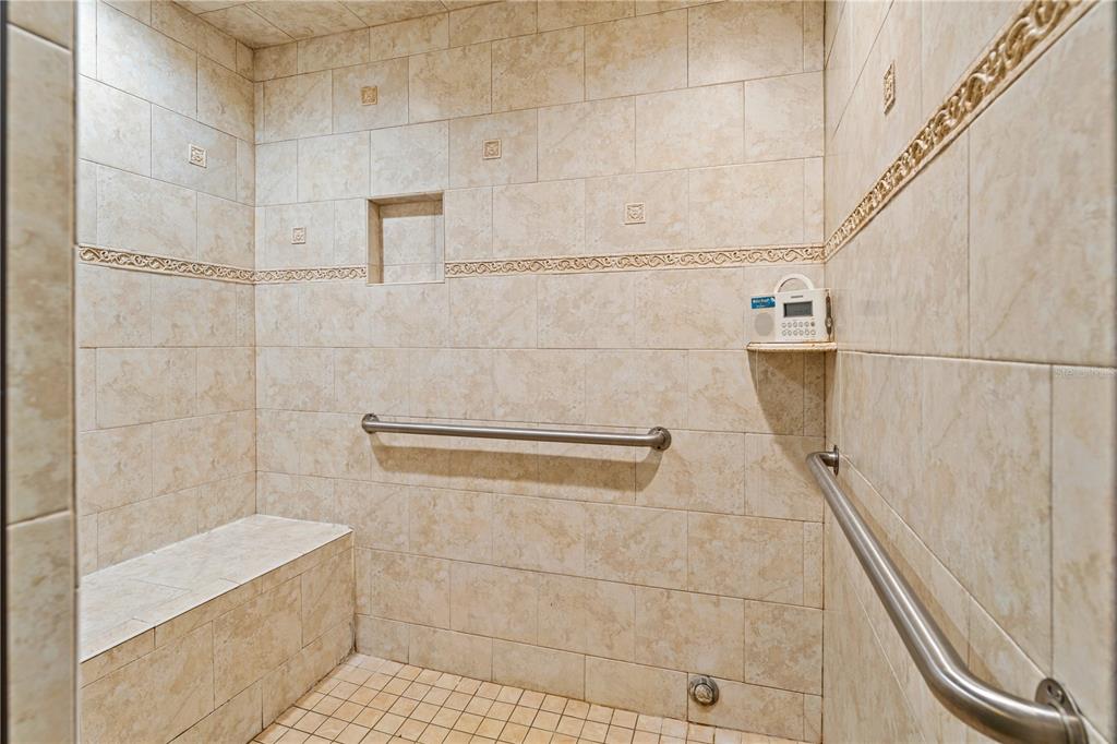 9504 Fort King Road Dade City, FL 33525 - Photo 19 of 51 a bathroom with a shower