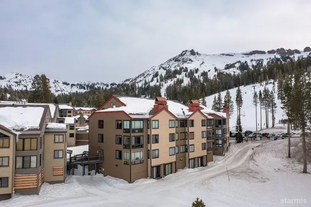 a view of city with tall buildings