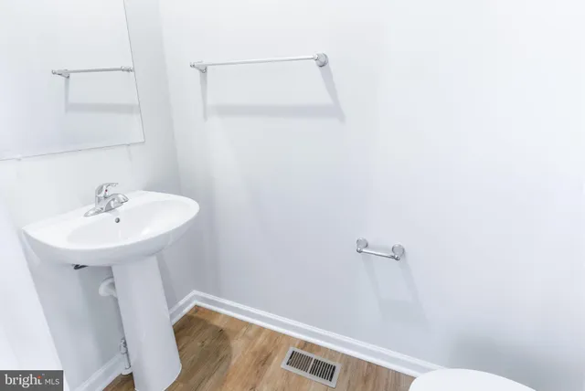 a bathroom with a sink and a toilet