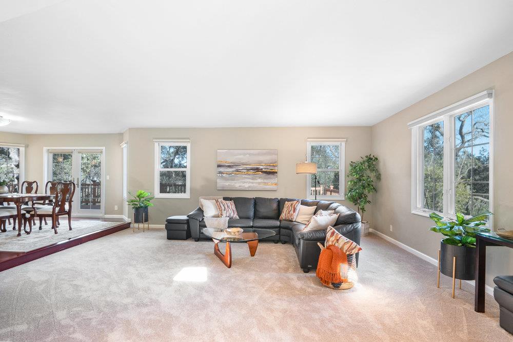 9160 Paseo Tranquillo Gilroy, CA 95020 - Photo 12 of 44 a living room with furniture and a fireplace