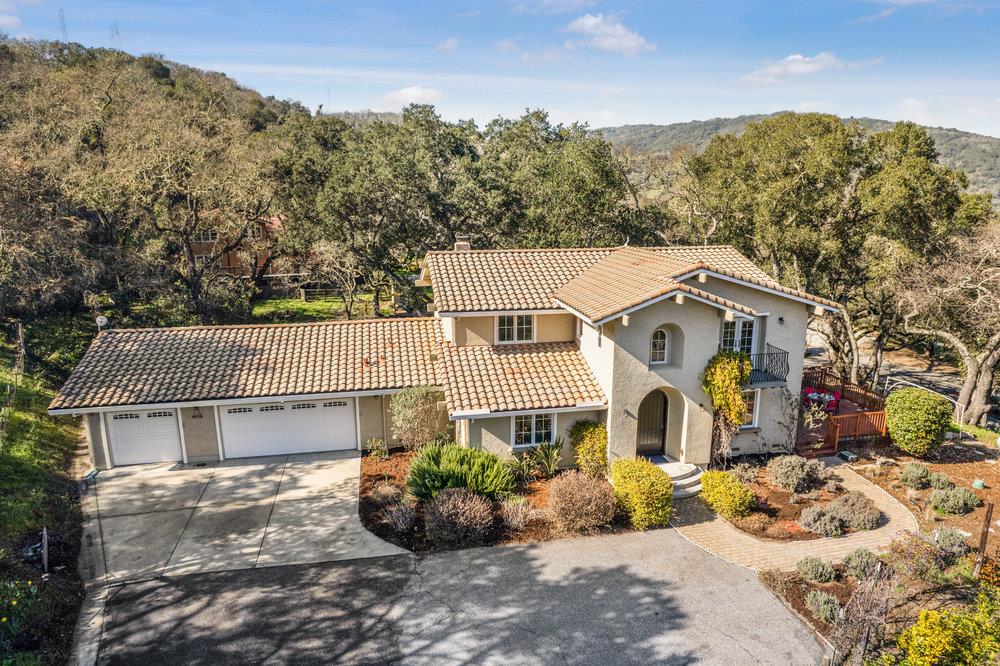 9160 Paseo Tranquillo Gilroy, CA 95020 - Photo 2 of 44 a front view of a house with a yard