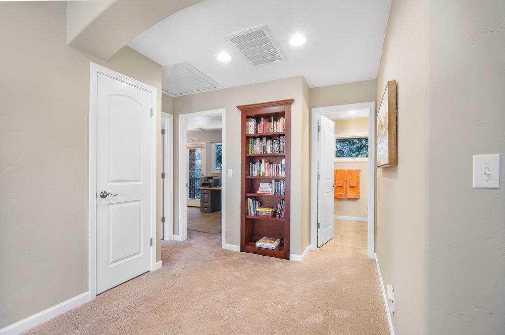 9160 Paseo Tranquillo Gilroy, CA 95020 - Photo 26 of 44 an empty room with closet and mirror