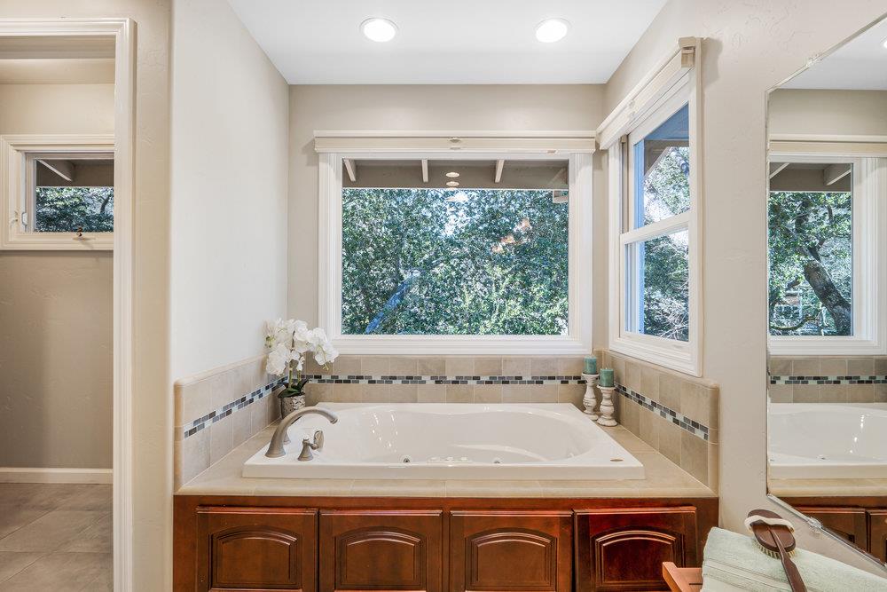 9160 Paseo Tranquillo Gilroy, CA 95020 - Photo 33 of 44 a bathroom with a bathtub and a sink