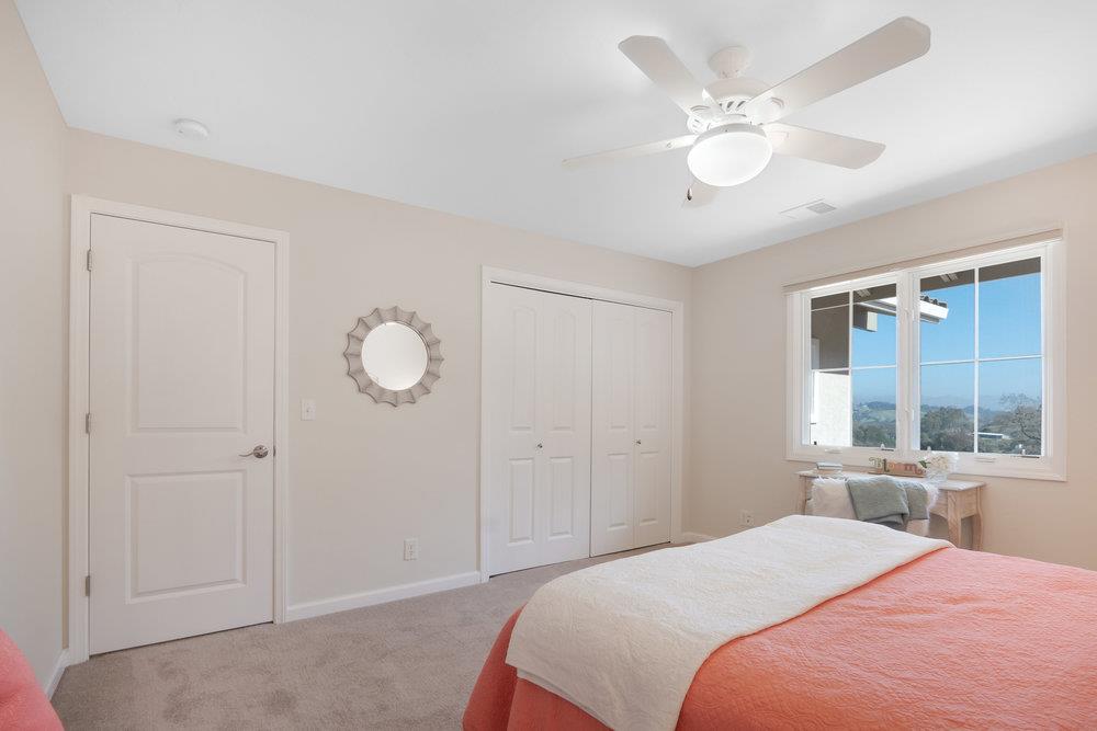 9160 Paseo Tranquillo Gilroy, CA 95020 - Photo 37 of 44 a bedroom with a bed and a window