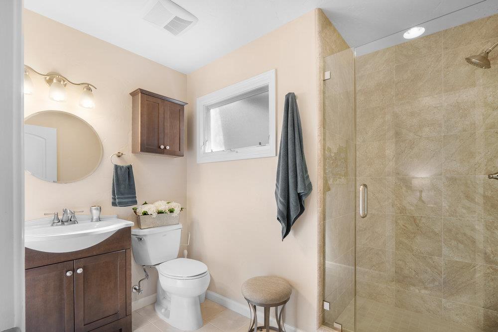 9160 Paseo Tranquillo Gilroy, CA 95020 - Photo 39 of 44 a bathroom with a sink toilet and shower