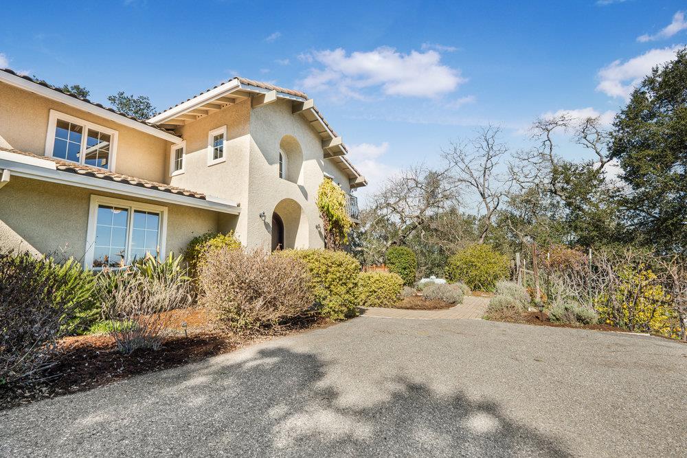 9160 Paseo Tranquillo Gilroy, CA 95020 - Photo 43 of 44 a front view of a house with a yard