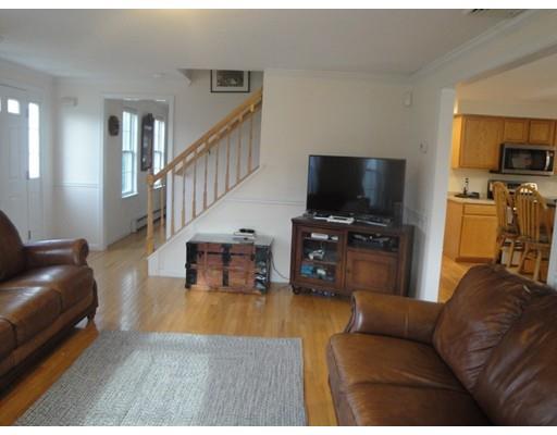 67 Mashapaug Road Sturbridge, MA 01566 - Photo 13 of 29 a living room with furniture and a flat screen tv