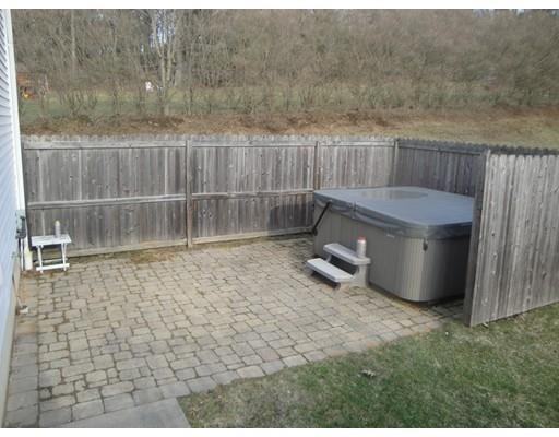 67 Mashapaug Road Sturbridge, MA 01566 - Photo 21 of 29 a area with wooden fence and a bench