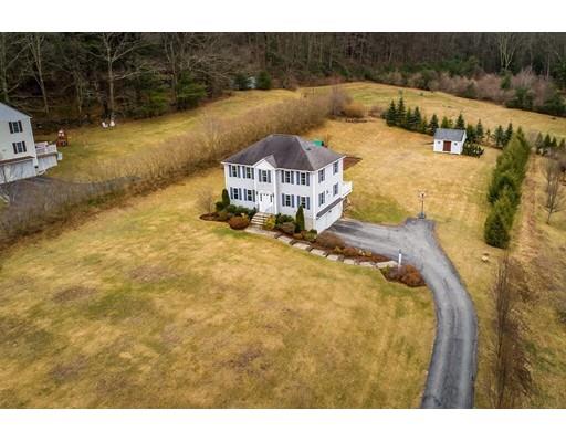 67 Mashapaug Road Sturbridge, MA 01566 - Photo 3 of 29 a view of a swimming pool with an outdoor space