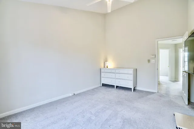 an empty room with a bench