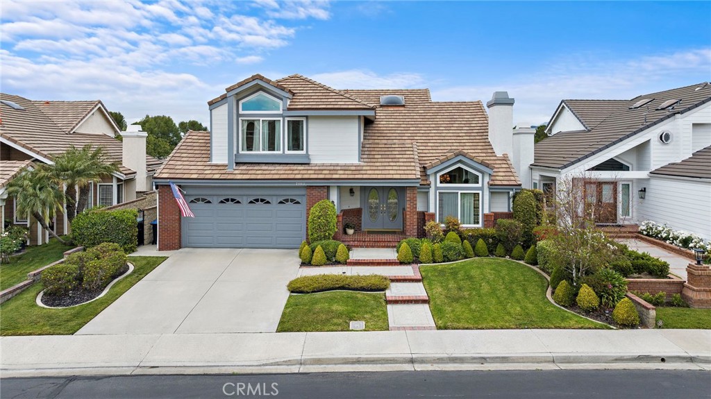 28811 Walnut Grove Mission Viejo, CA 92692 - Photo 1 of 48 a front view of a house with a yard