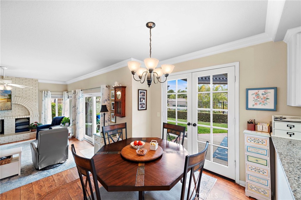 28811 Walnut Grove Mission Viejo, CA 92692 - Photo 13 of 48 a view of a dining room with furniture window and wooden floor