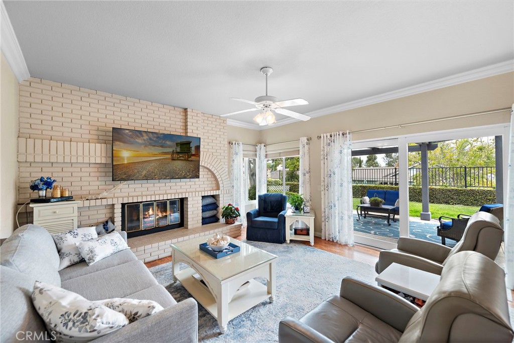 28811 Walnut Grove Mission Viejo, CA 92692 - Photo 16 of 48 a living room with fireplace furniture and a flat screen tv