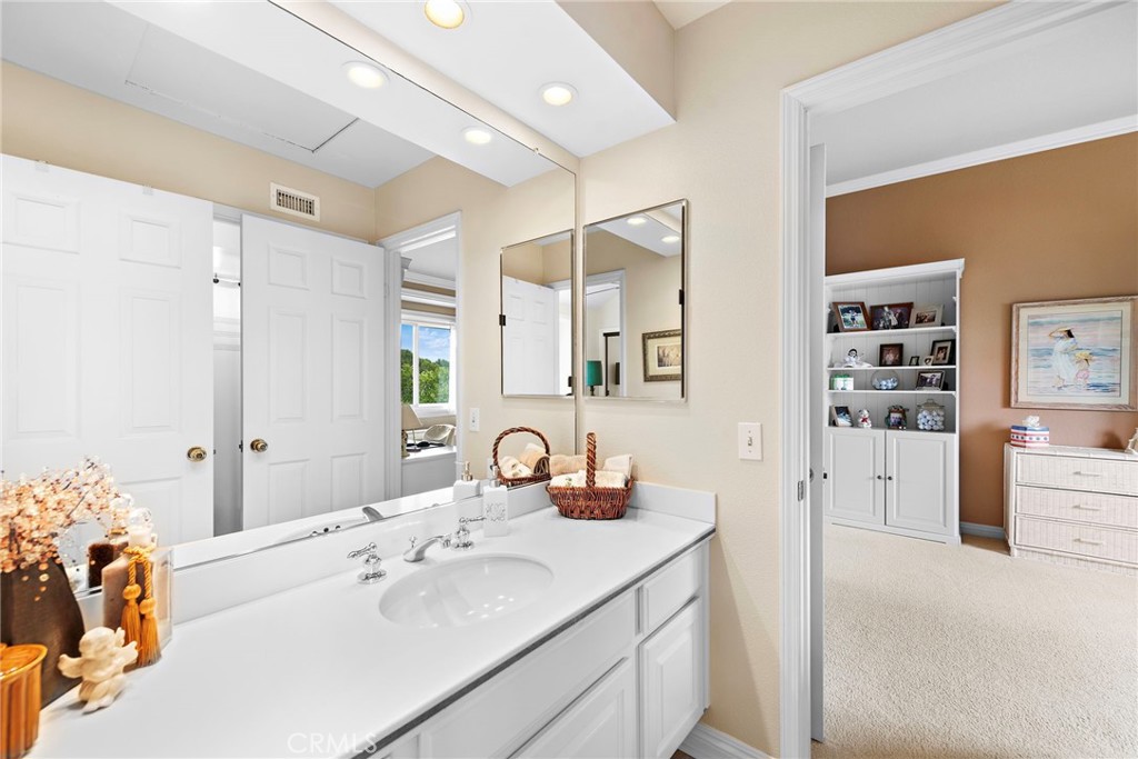 28811 Walnut Grove Mission Viejo, CA 92692 - Photo 23 of 48 a en suite bathroom with a double vanity sink mirror and shower