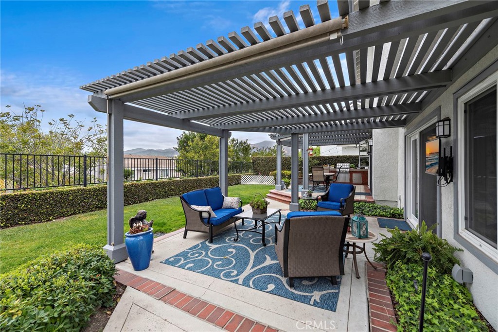 28811 Walnut Grove Mission Viejo, CA 92692 - Photo 28 of 48 a view of a patio with couches chairs and a table and chairs