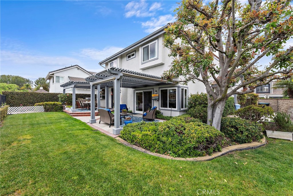 28811 Walnut Grove Mission Viejo, CA 92692 - Photo 30 of 48 a front view of a house with swimming pool and porch