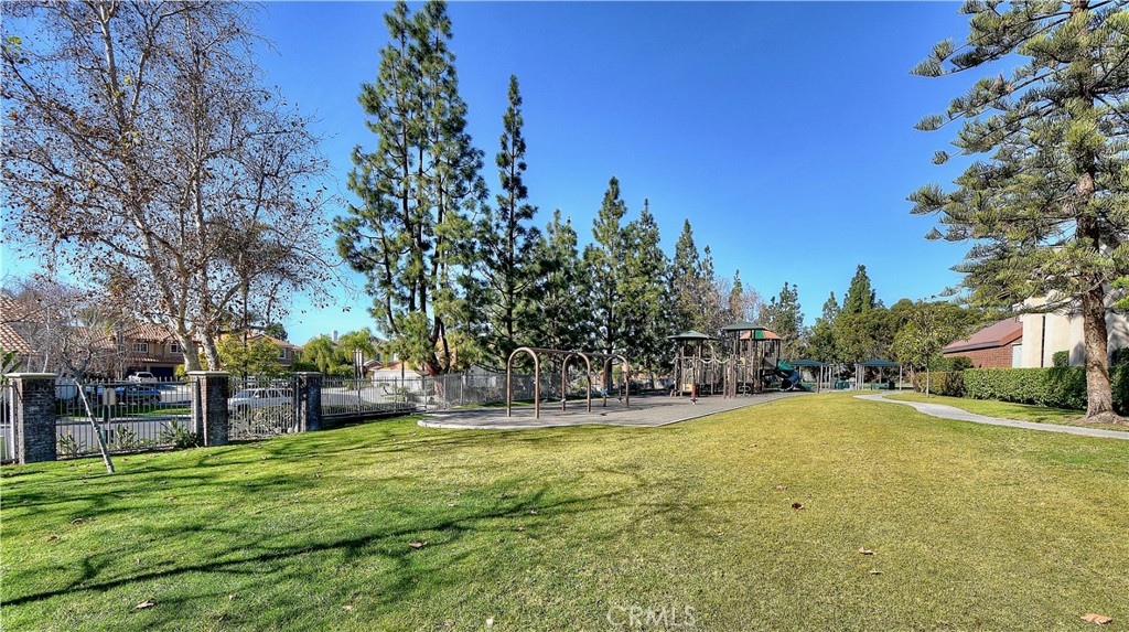 28811 Walnut Grove Mission Viejo, CA 92692 - Photo 37 of 48 a view of a yard with a house in the background