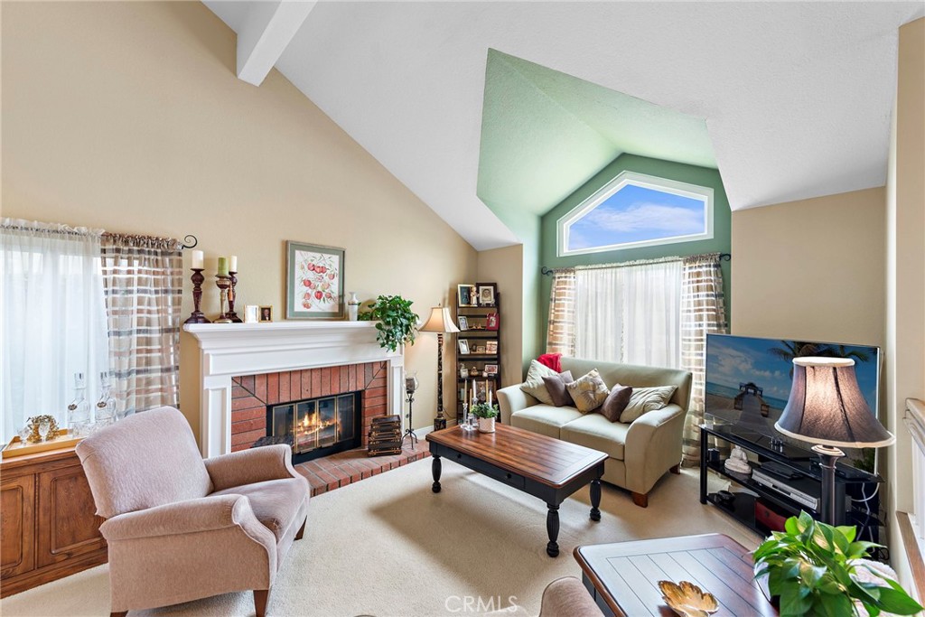 28811 Walnut Grove Mission Viejo, CA 92692 - Photo 5 of 48 a living room with furniture a rug a window and a fireplace