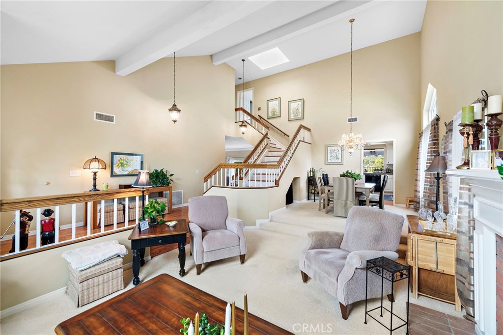 28811 Walnut Grove Mission Viejo, CA 92692 - Photo 7 of 48 a living room with furniture and a book shelf