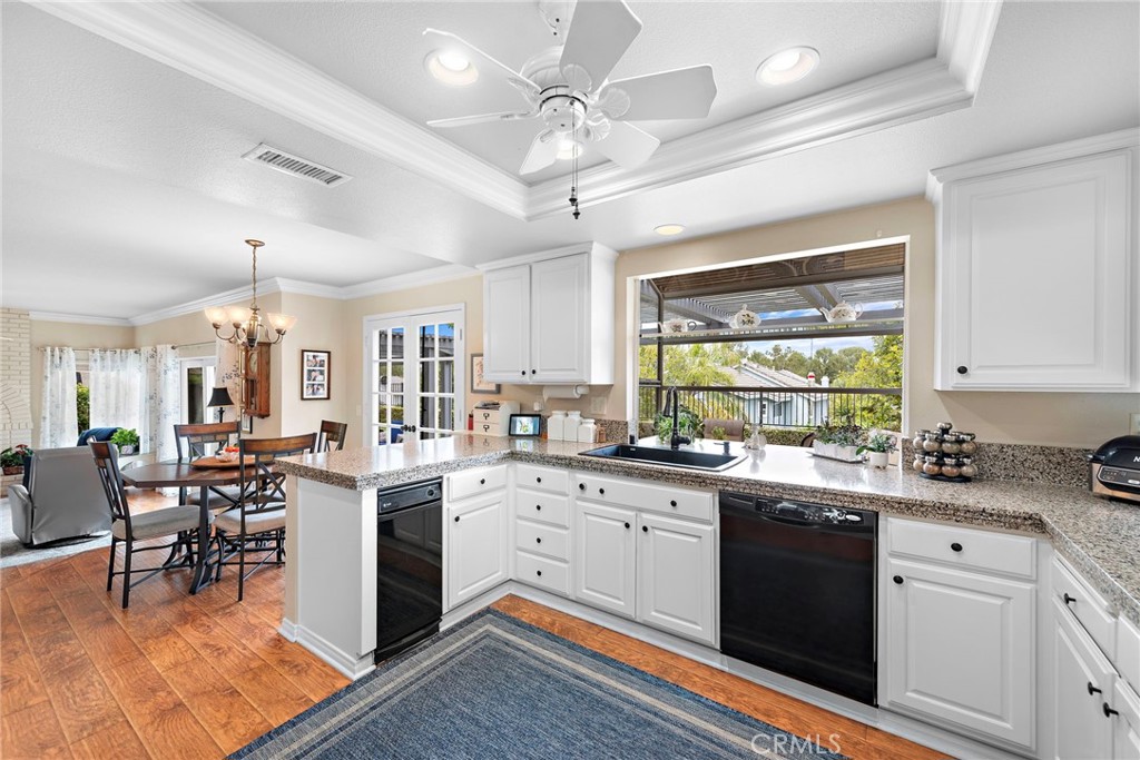 28811 Walnut Grove Mission Viejo, CA 92692 - Photo 10 of 48 a kitchen with a sink stove and cabinets