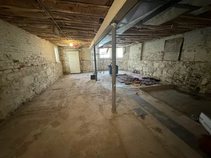 a view of a room with wooden walls