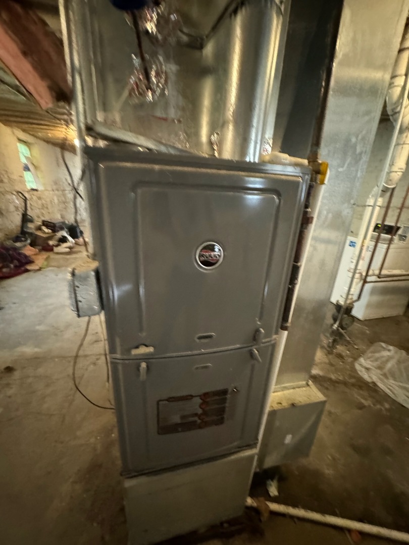 3833 West Arthington Street Chicago, IL 60624 - Photo 22 of 22 a close view of water heater