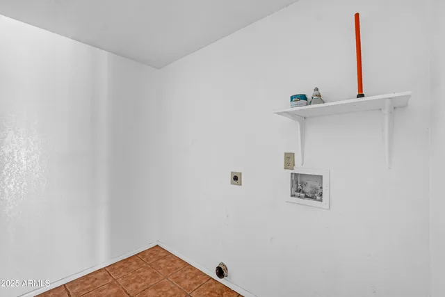 a bathroom with a granite countertop sink toilet a mirror and shower