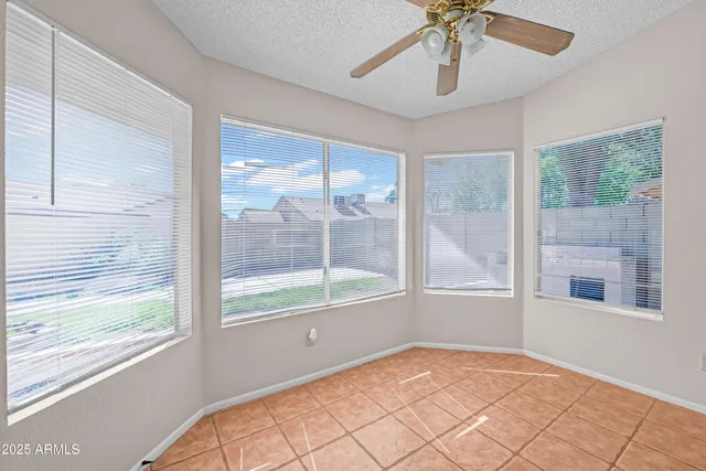 a kitchen with granite countertop a sink stainless steel appliances and cabinets