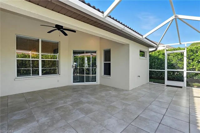 a view of an empty room with a balcony