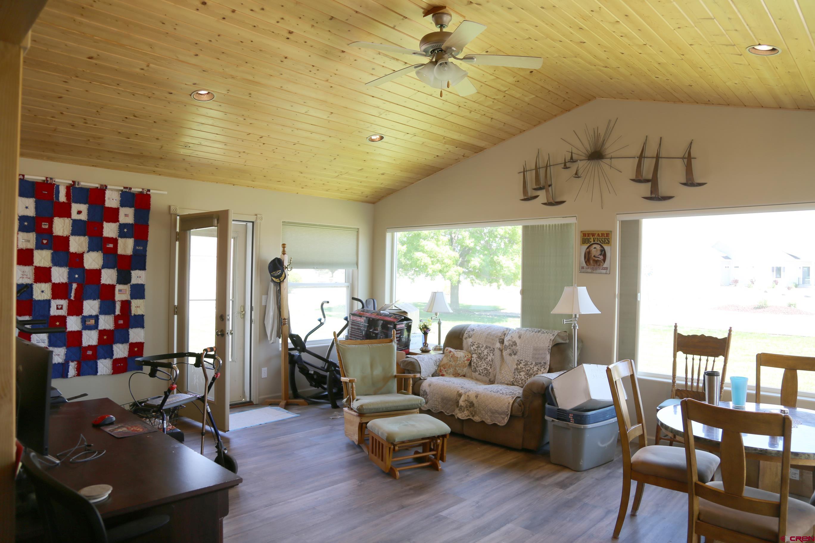 20287 Fox Ridge Drive Austin, CO 81410 - Photo 15 of 16 a living room with furniture or couch and a large window