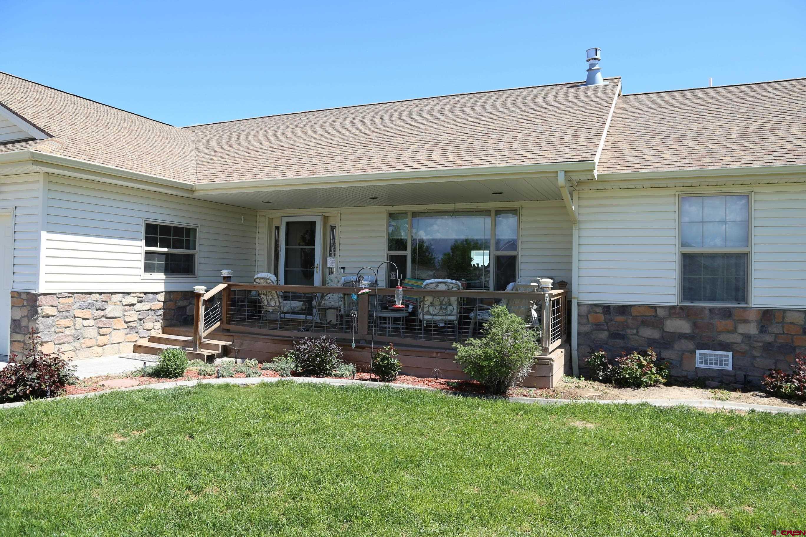 20287 Fox Ridge Drive Austin, CO 81410 - Photo 3 of 16 a view of a house with patio