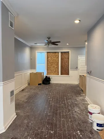 a view of a livingroom with a furniture and window