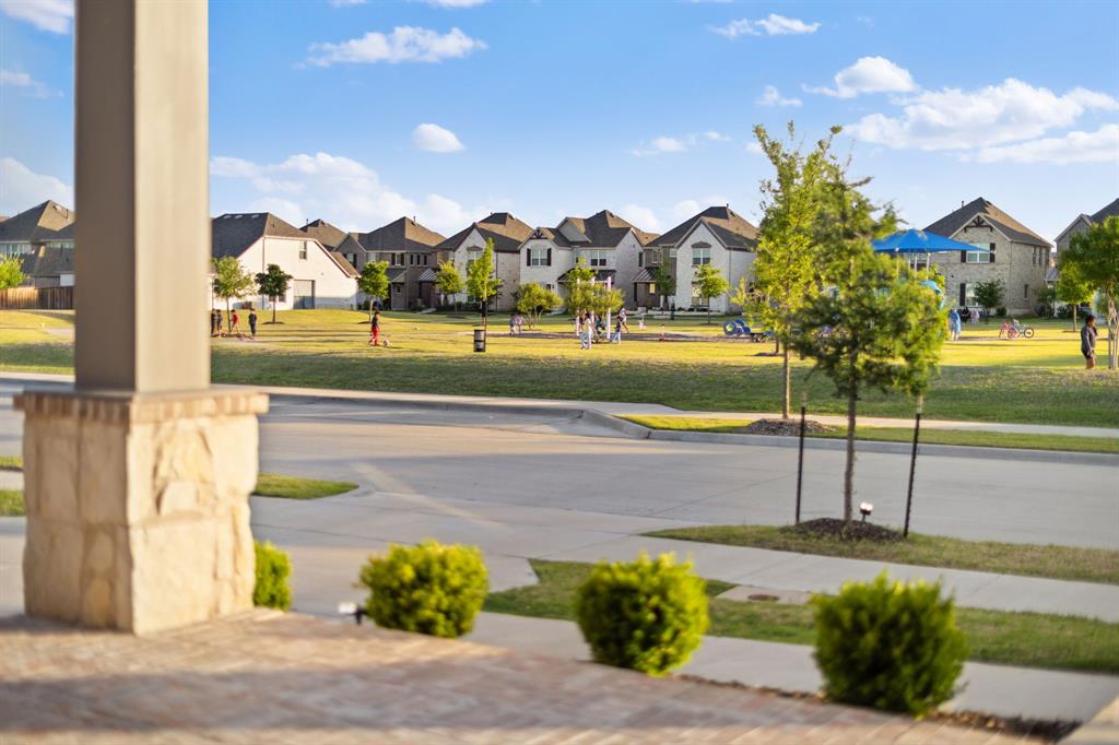 8808 Royal Star Road Rowlett, TX 75089 - Photo 13 of 40 a view of swimming pool with an outdoor seating