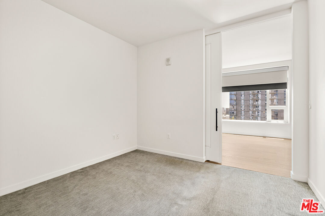 1050 South Grand Avenue, Unit 1405 Los Angeles, CA 90015 - Photo 6 of 11 a view of an empty room