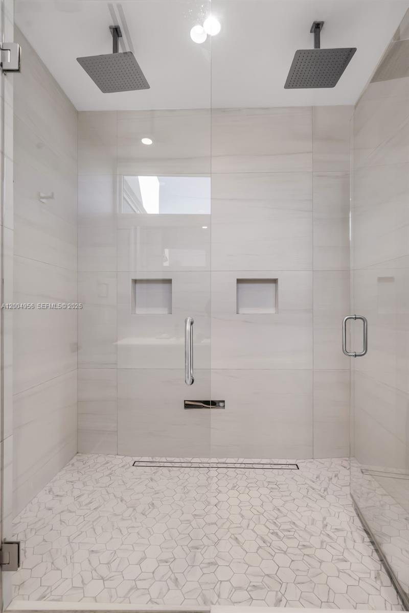 285 West Mashta Drive Key Biscayne, FL 33149 - Photo 25 of 42 a bathroom with a shower