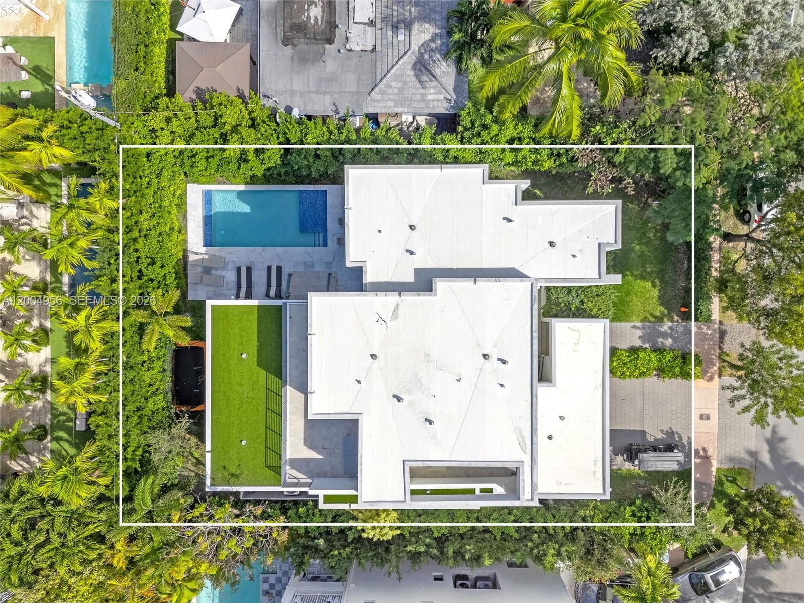285 West Mashta Drive Key Biscayne, FL 33149 - Photo 39 of 42 aerial view of a house with a garden