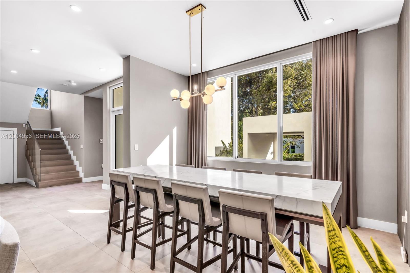 285 West Mashta Drive Key Biscayne, FL 33149 - Photo 6 of 42 a dining room with furniture and window