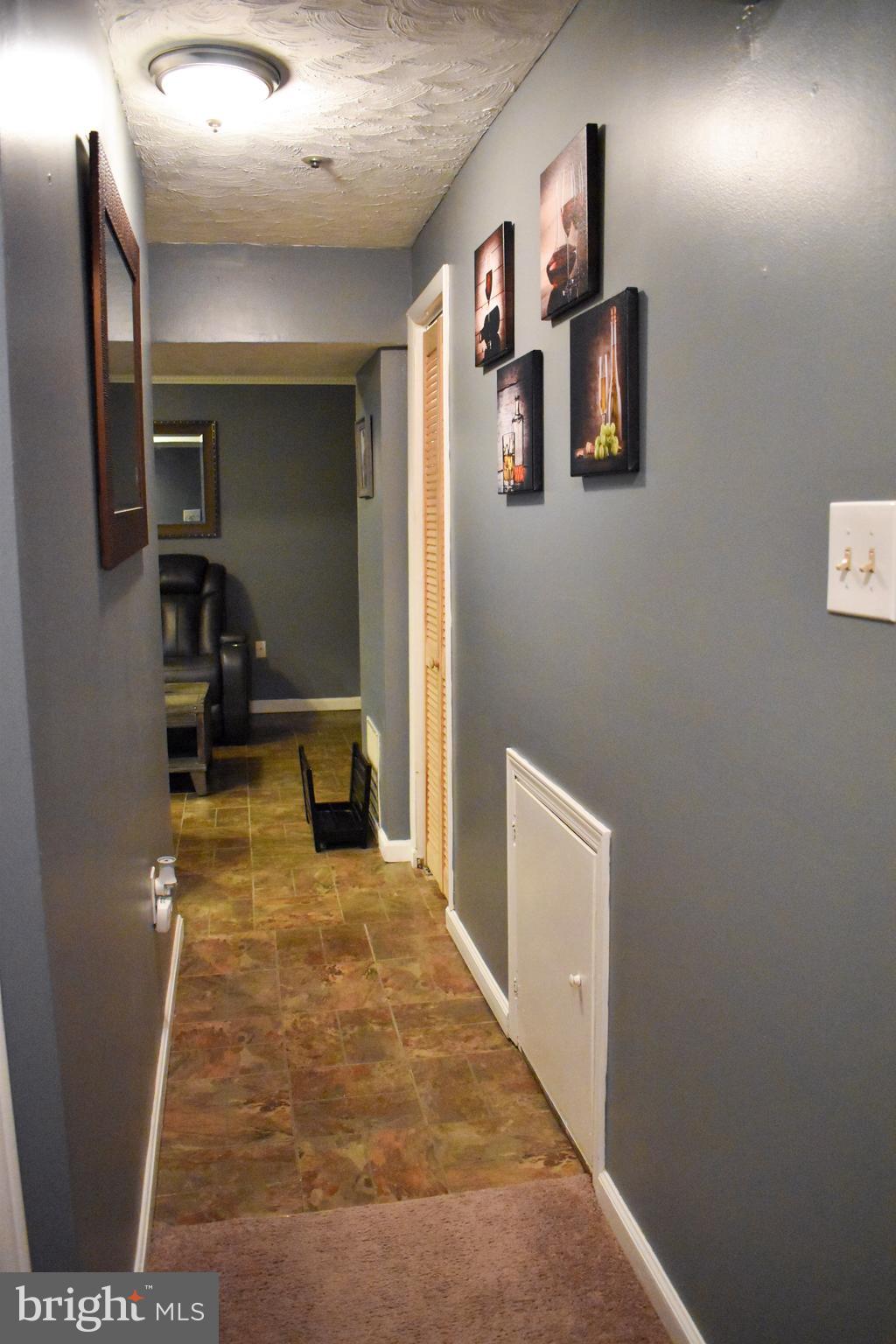 8633 Ritchboro Road District Heights, MD 20747 - Photo 17 of 29 Hallway in the basement