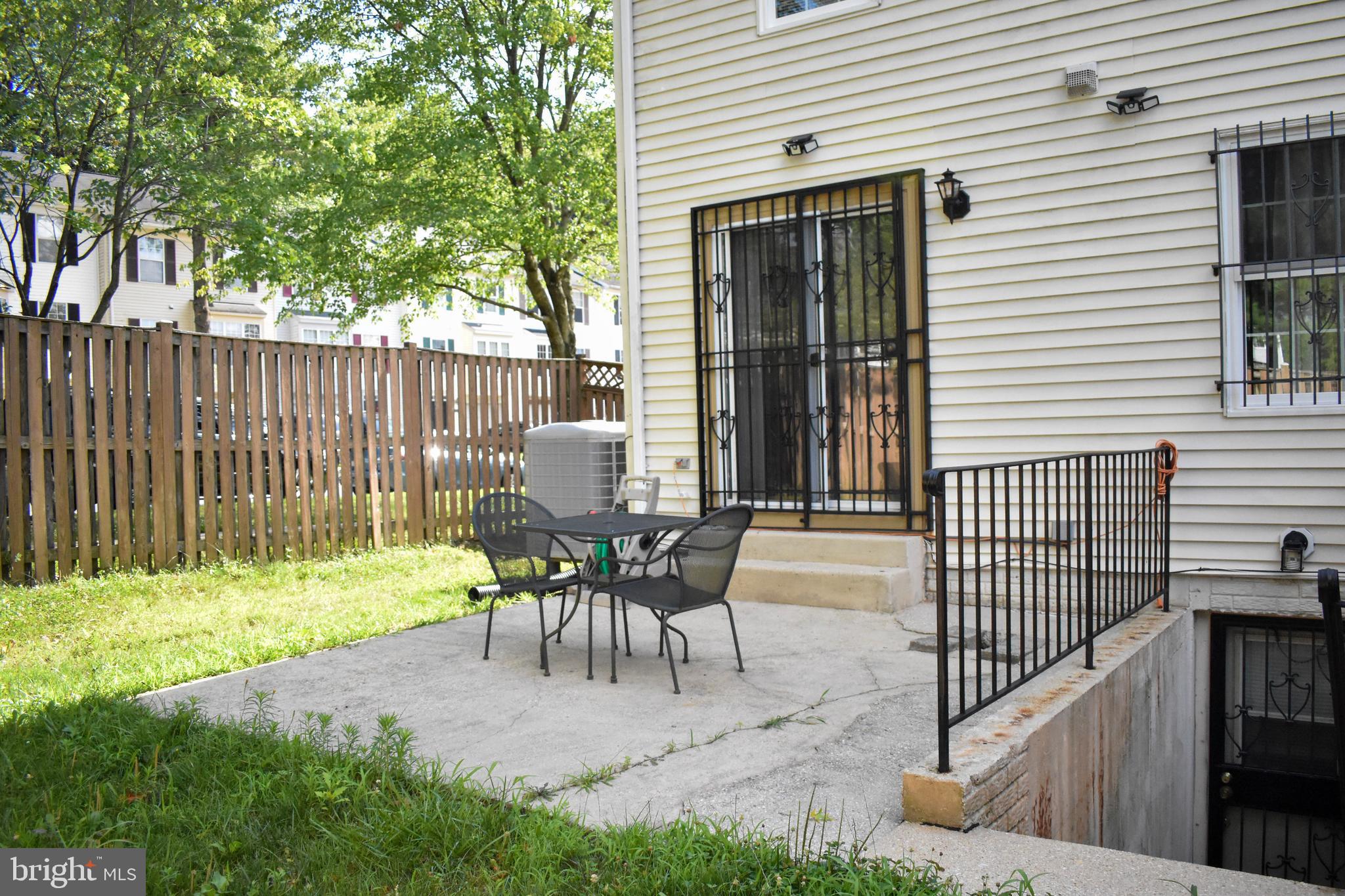 8633 Ritchboro Road District Heights, MD 20747 - Photo 27 of 29 Backyard with patio