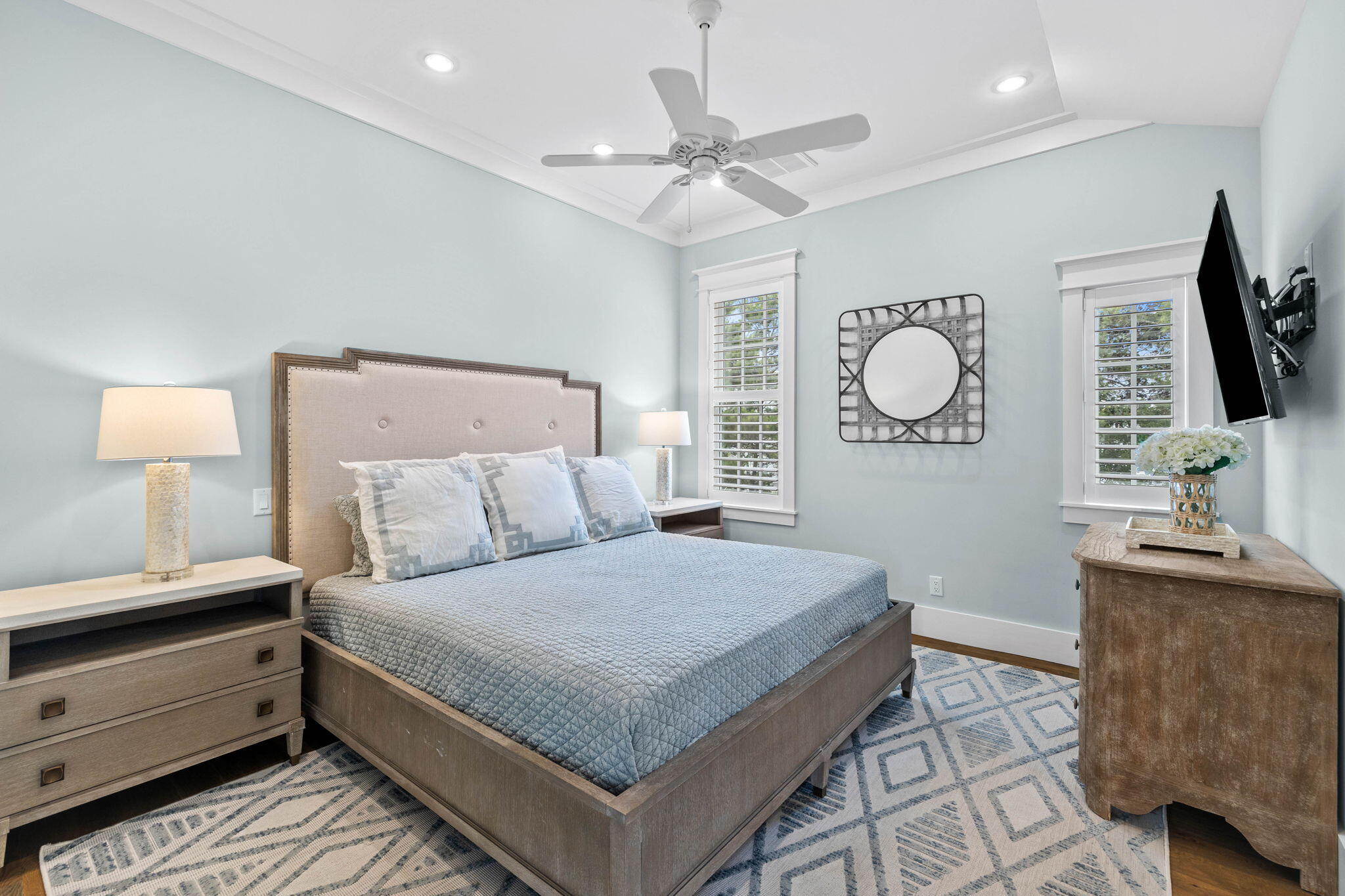 28 Honor Ln Inlet Beach Inlet Beach, FL 32461 - Photo 42 of 99 a bedroom with a large bed and a chandelier