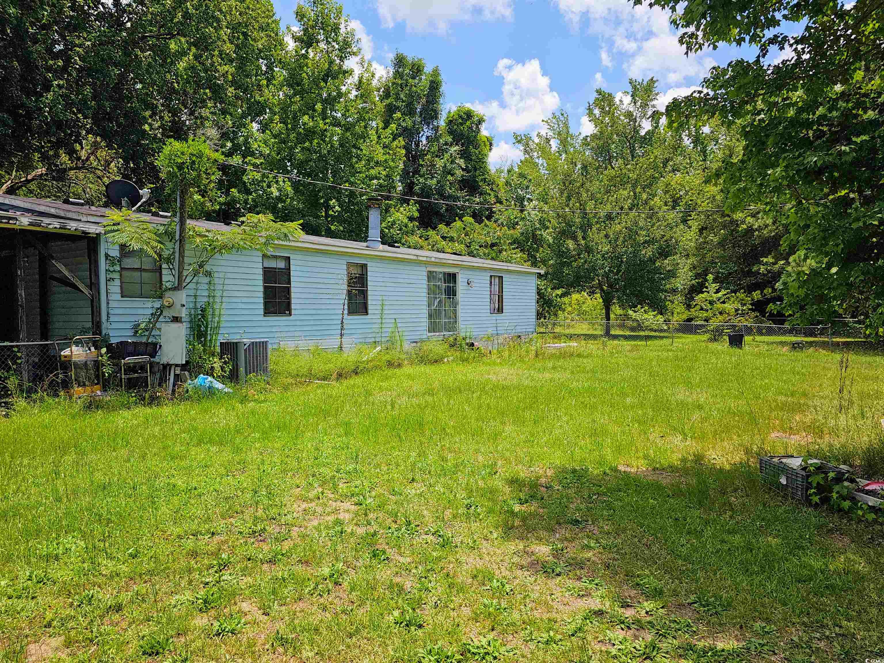 827 1/2 North Firetower Road Florence, SC 29506 - Photo 23 of 29 View of yard
