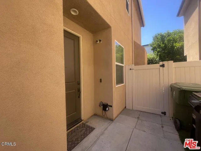 a bathroom with a bathtub a shower a sink and a window
